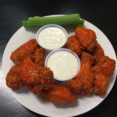 Immerse yourself in a world of wonder with our wing options at Hudson Ave